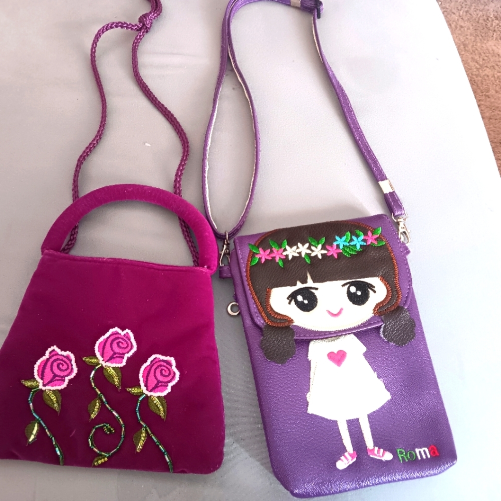 Pair of girls shoulder purses
